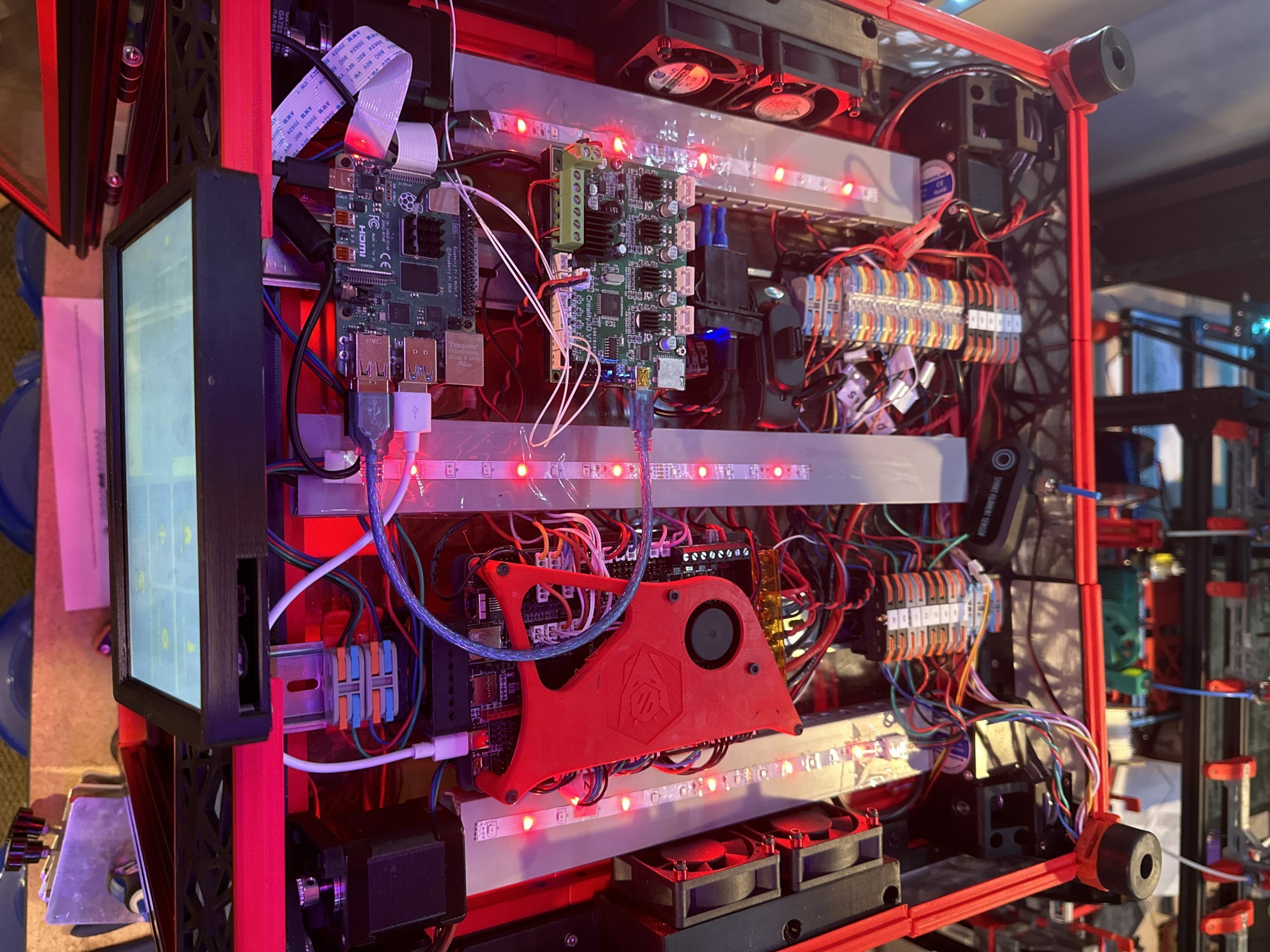 Wiring, cooling fans, and control electronics inside a fabrication machine