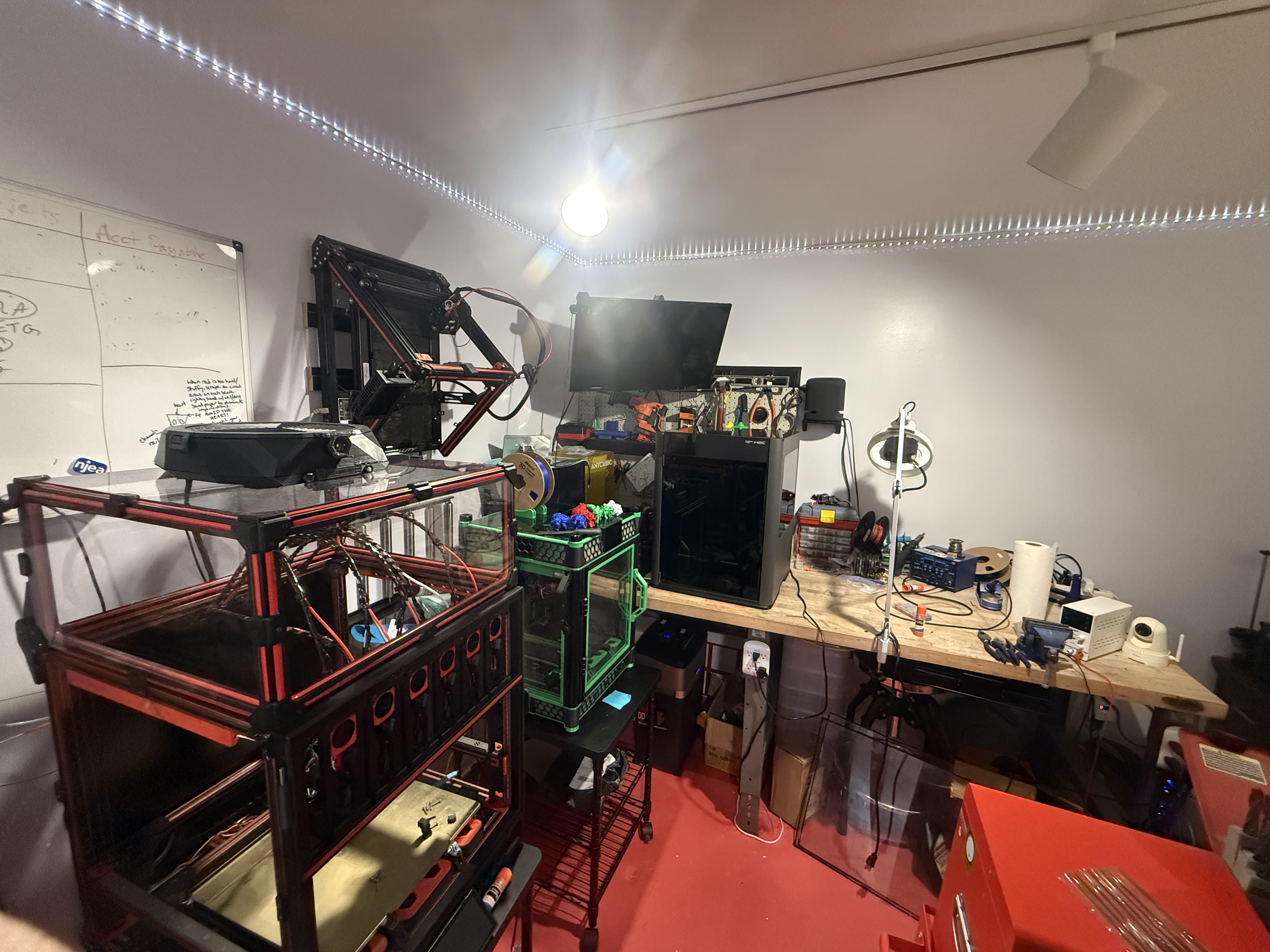 Several 3D printers and repair tools in DDA’s workshop