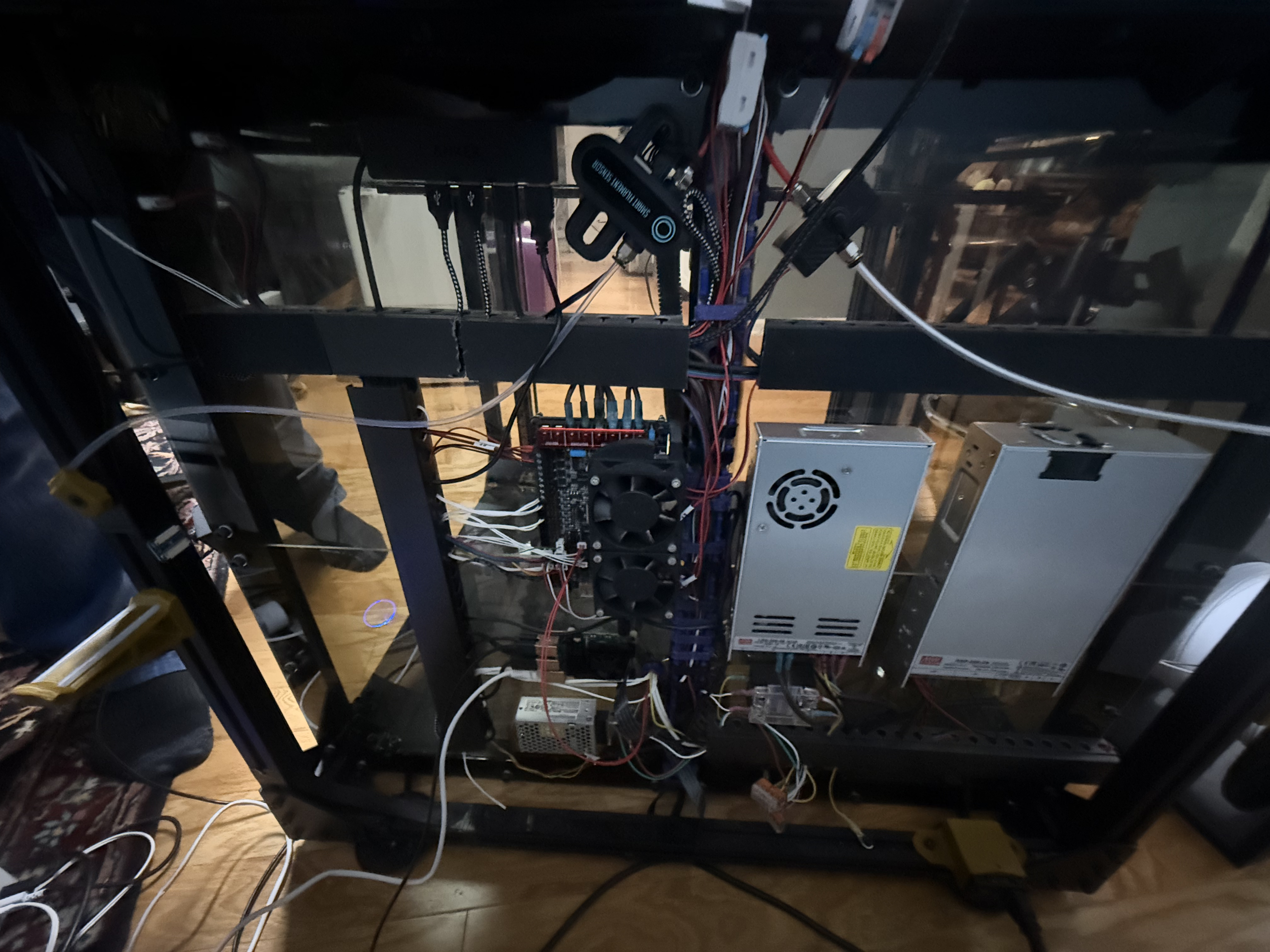 Accessible electronics, wiring, and power supplies beneath a 3D printer